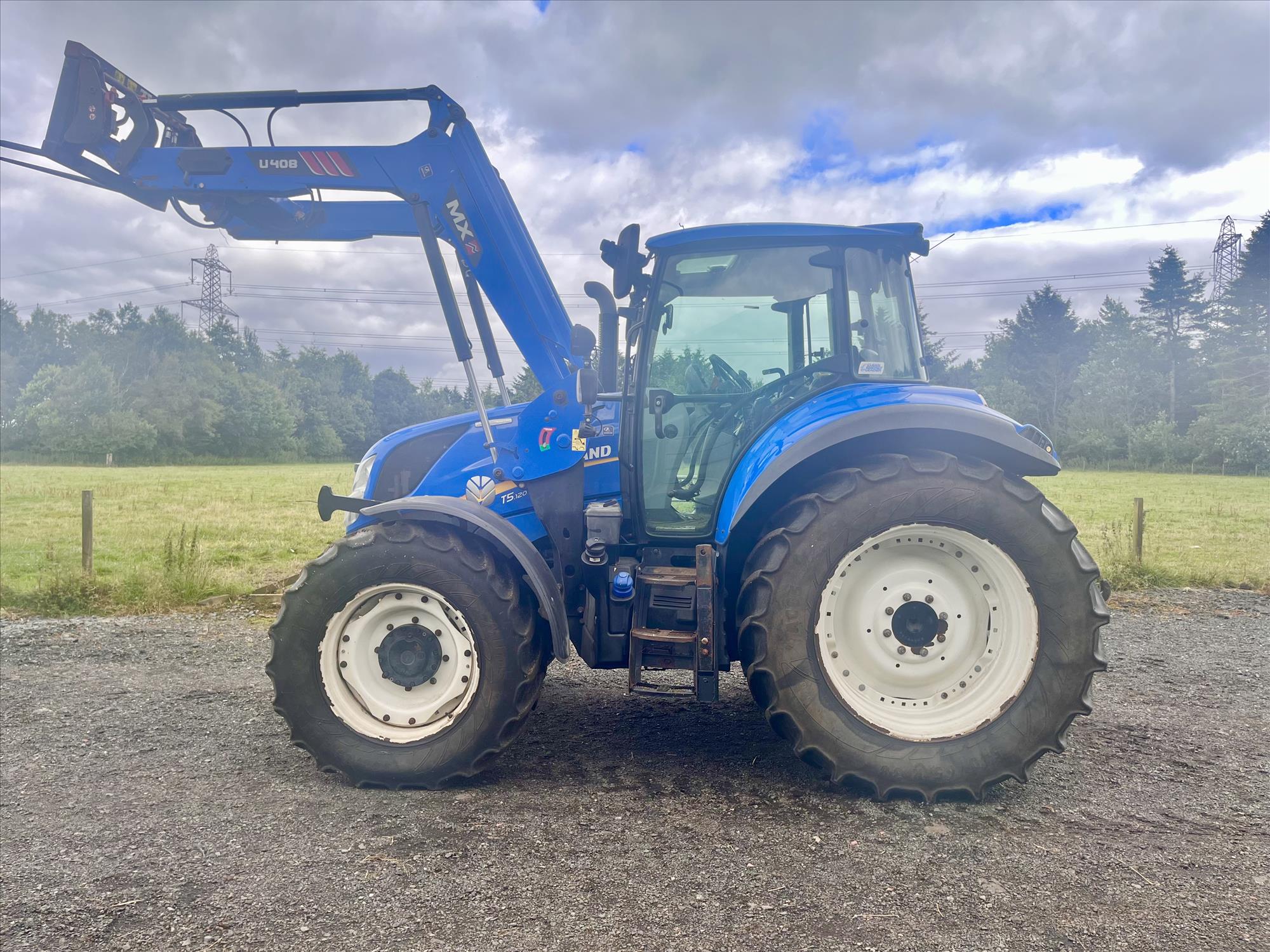 New Holland T5. 120 E/Comm